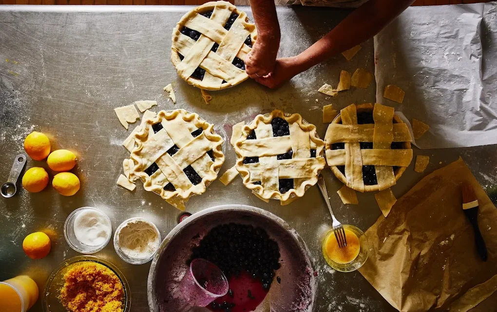 Someone making homemade pies